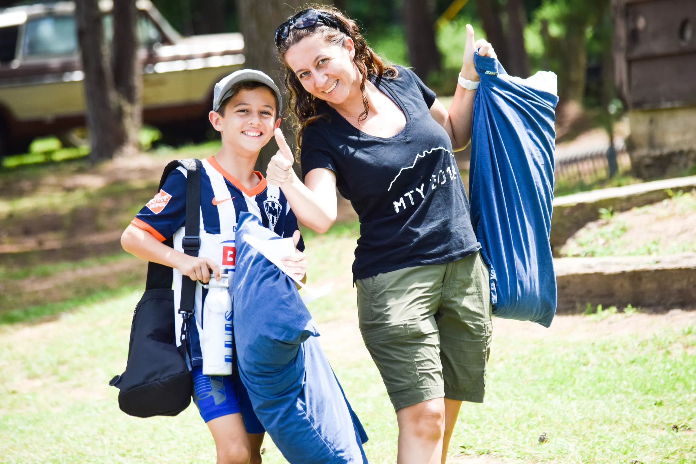 Camper trunks and duffel bags unloaded on opening day at Camp Huawni