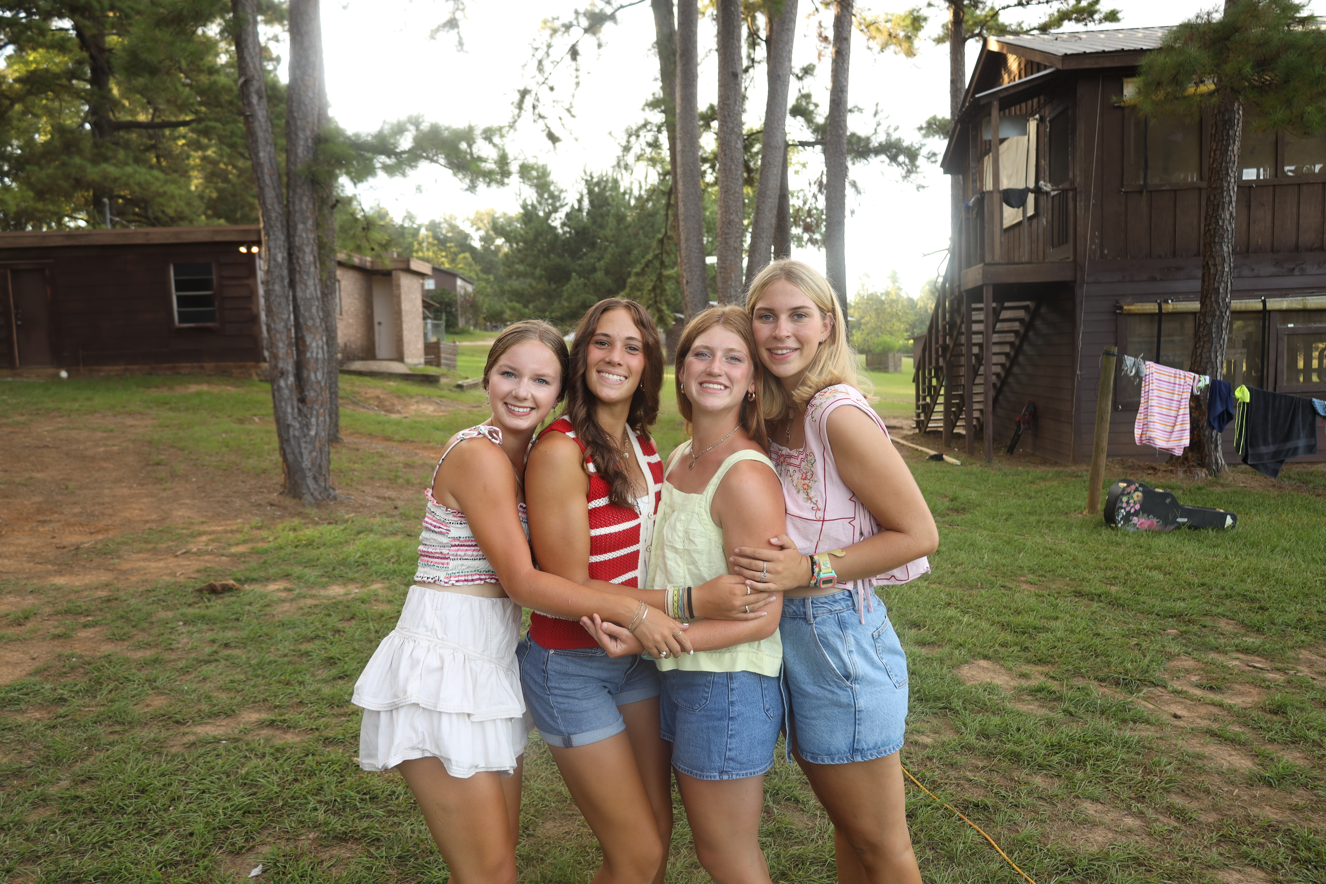 A Camp Huawni counselor leading campers through an outdoor activity